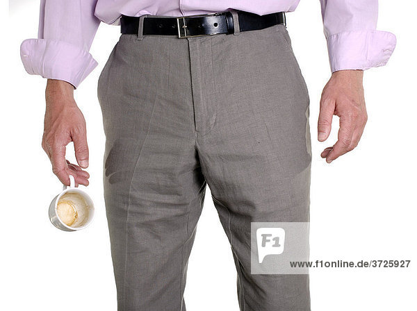 Business man with empty coffee cup  conceptual shot