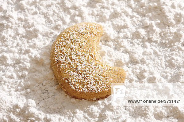 Shortcrust cookie  crescent on powdered sugar