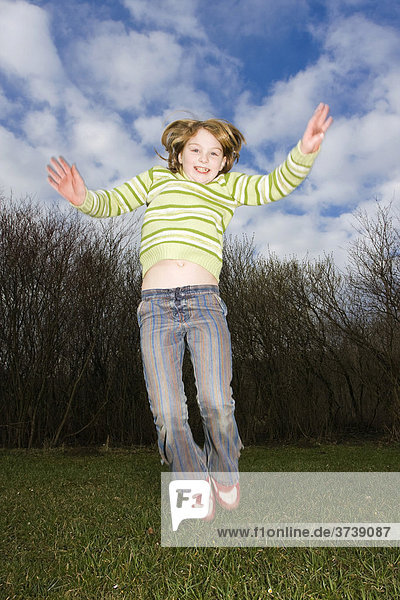 Jumping little girl  9 years