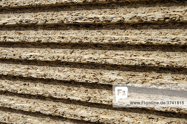 Stacked chipboards  front edge with notch  timber industry