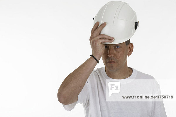Man putting on a safety helmet  hardhat