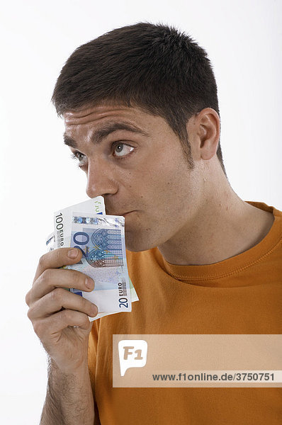 Man smelling money  cash