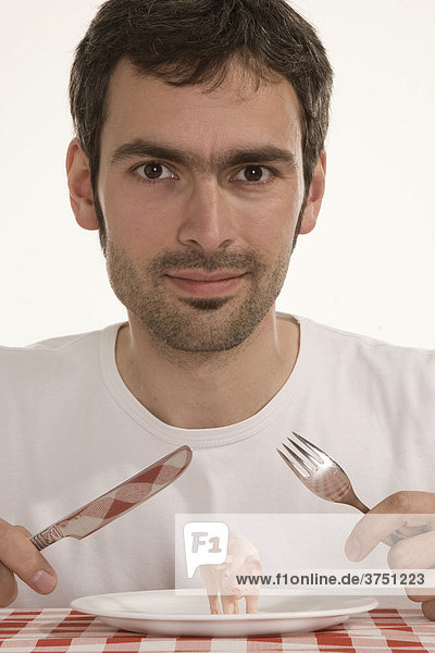 Mann mit Schwein auf Teller  Ernährung  Genmanipulation
