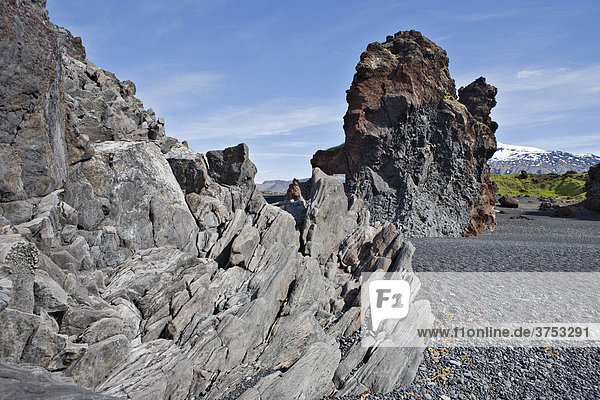 Bizarre rock formations on the beach at DjupalÛnssandur Snaefellsness Peninsula Iceland Atlantic Ocean