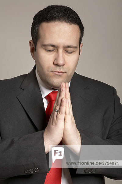 Geschäftsmann beim Gebet