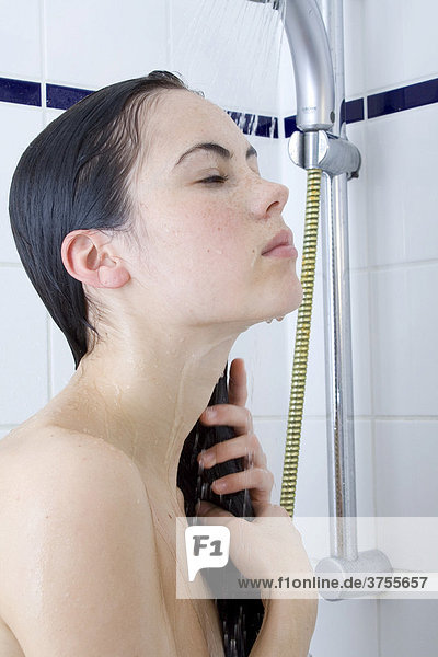 Dark-haired woman in the shower