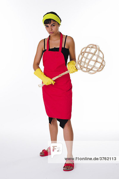 Cleaning lady with carpet beater
