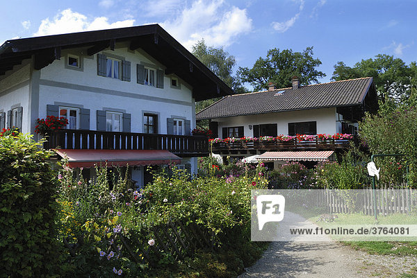 Houses and flower gardens at the island Fraueninsel  Chiemsee  Chiemgau  Bavaria  Germany