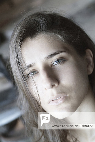 Portrait of a young woman with long brown hair ThÈoule-sur-Mer France Europe