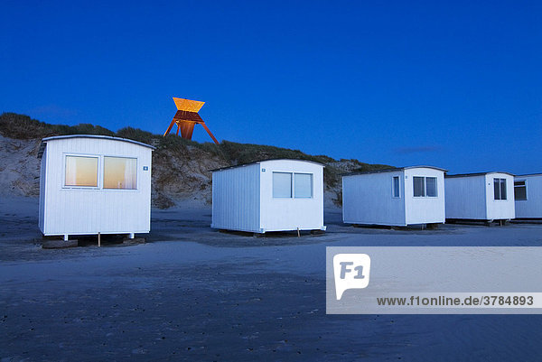 Typical huts at the beach in Blokhus near Loekken at dusk  Jutland  Denmark