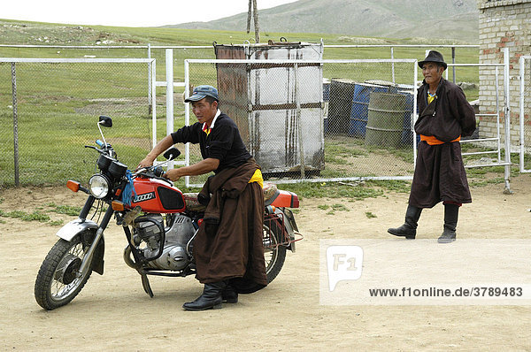 Mongol with his motorbike Khujirt Mongolia