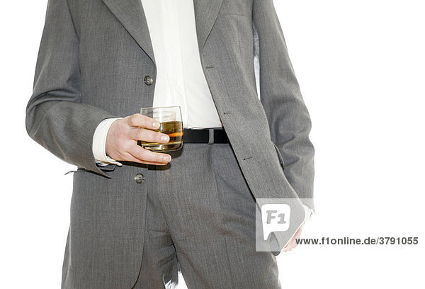 Cool business man holds his drink