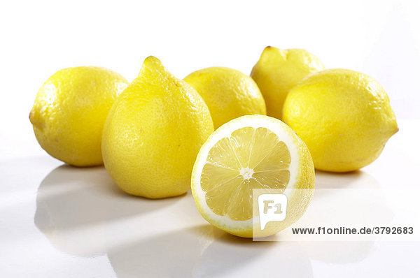 Heap of lemons one cut open