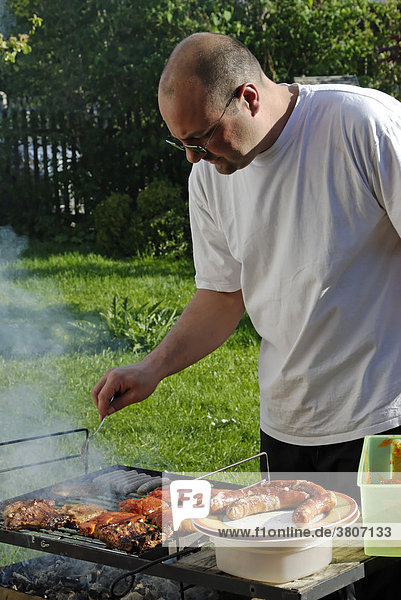 Man having a barbecue