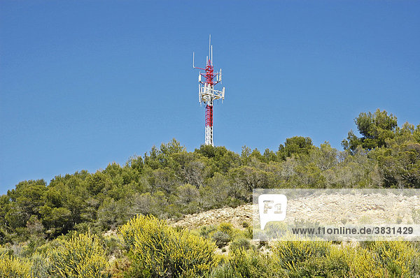 Red white radio pole on a mountain  Altea  Costa Blanca  Spain