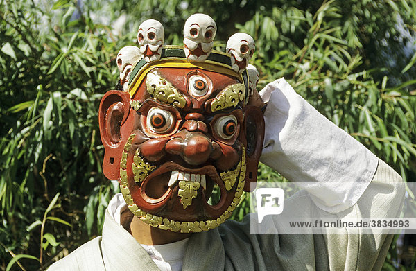 Portrait with mask buthan
