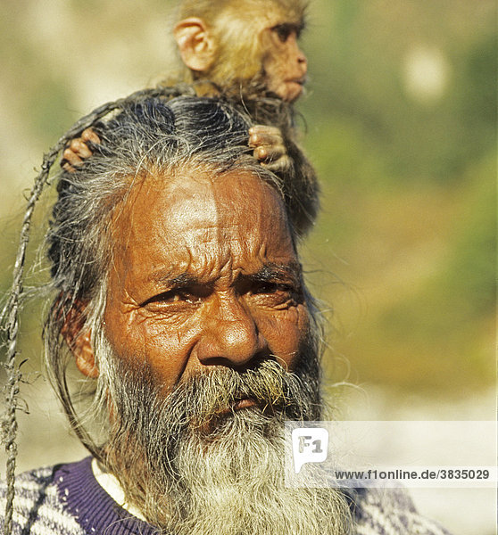 Sadus with monkey the sacred mens india