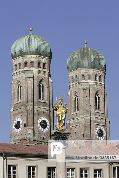 Munich  GER  18. Oct. 2005 - Mariensaeule on Marienplatz in Munich city centre. In the background the steeples of Frauenkirche.