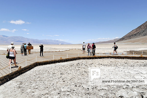 Tourists at the lowest point of the USA  Badwater Basin  Death Valley National Park  California  USA  North America