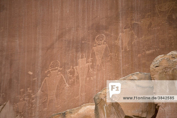 Petroglyphs etched by Fremont Indians in sandstone cliff  Capitol Reef National Park  Utah  USA