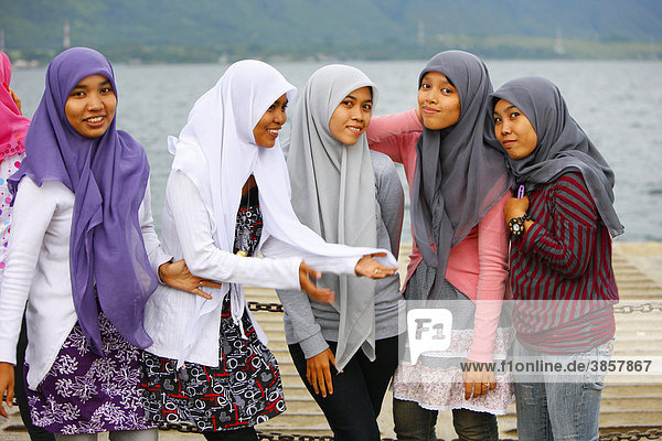 Muslim young women  Samosir island  Lake Toba  Batak region  Sumatra  Indonesia  Asia