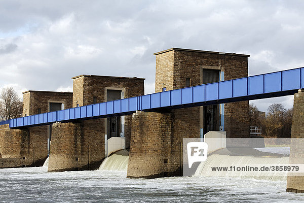 Ruhr river dam and lock water flowing over the weir overflow Duisburg North Rhine-Westphalia Germany Europe