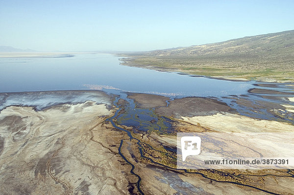 above aerial Aerial Africa african angle birds birds-eye bodies body countryside day daylight daytime during elevated estuaries estuary exterior exteriors eye flowing fluvial from high high-angle in into Lake lake lakes landscape landscapes mouth mouths Natron nature nobody Northern of on outdoor perspective perspectives photo photograph photographs photos river rivers saline scenery scenic shot shots Tanzania the top topography topview topviews view views water waters