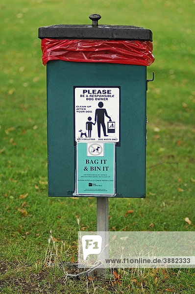 Dog waste bin in a public park  United Kingdom  Europe