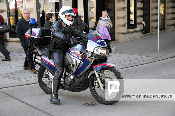 Policeman with a motorcycle  Kaerntner Strasse  Vienna  Austria  Europe