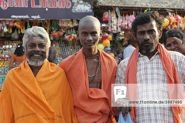 Men of three generations  Thaipusam Festival  Hindu festival  Palani  Tamil Nadu  Tamilnadu  South India  India  Asia