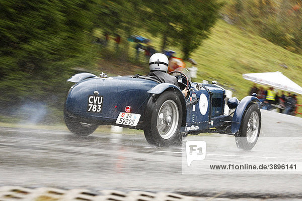 Classic car in the rain  Riley TT Sprite  built in 1936  Jochpass Memorial 2009 rally  Bad Hindelang  Bavaria  Germany  Europe