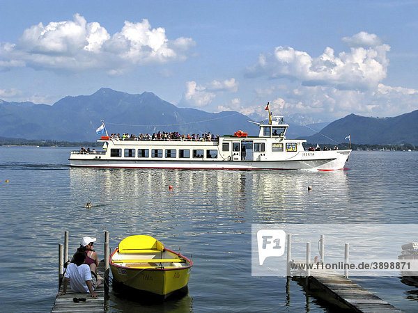 Boat ferry and pier jetty  Lake Chiemsee  Chiemgau  Upper Bavaria  Germany  Europe