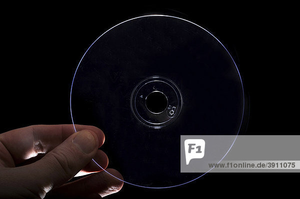 Hand holding a data cd