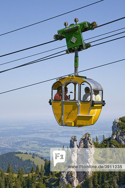 Gondola of the Kampenwandbahn cable car  Mt. Kampenwand  view to Lake Chiemsee  Chiemgau  Bavaria  Germany  Europe