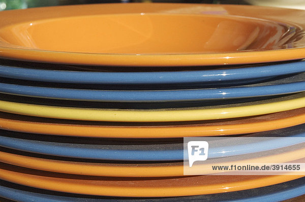 Colourful plates stacked and slightly dusty  Auer Dult  Munich  Upper Bavaria  Bavaria  Germany  Europe