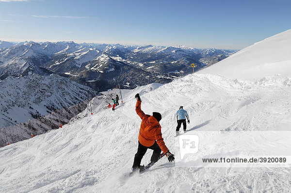 Skiers at the summit  Nebelhorn  2224m  Oberstdorf  Allgaeu  Bavaria  Germany  Europe