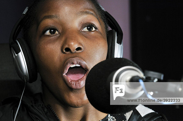 Teenager on the air in their own radio station  HIV AIDS Awareness  loveLife Youth Centre  slum  Orangefarm Township  Johannesburg  South Africa  Africa