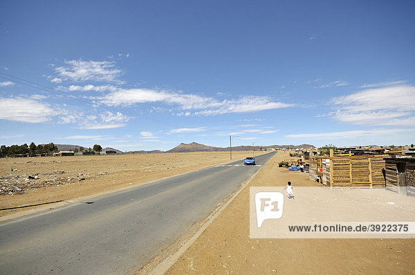 Slum district  township  at the edge of a road  Queenstown  Eastern Cape  South Africa  Africa
