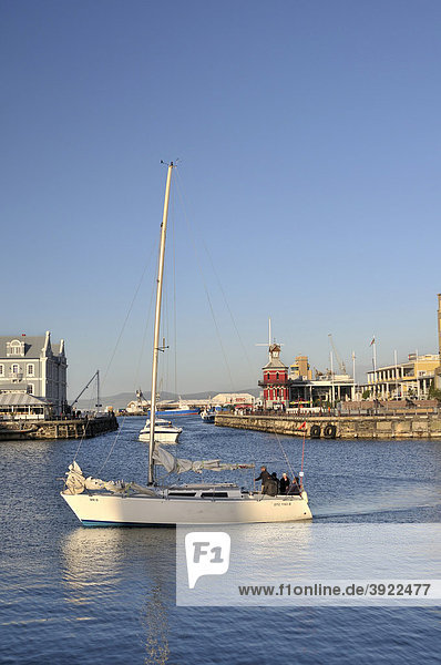 Sailboat entering the marina  Waterkant district  V & A Waterfront  Cape Town  South Africa  Africa