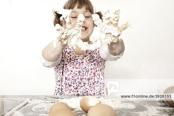 Six-year-old girl baking