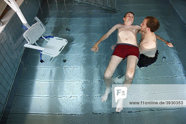 Individual therapy in a heated pool  physical therapy in a neurological rehabilitation centre  Bonn  North Rhine-Westphalia  Germany  Europe