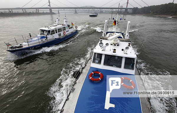 Boat of the water police patrolling on the Rhine river at Duisburg  North Rhine-Westphalia  Germany  Europe