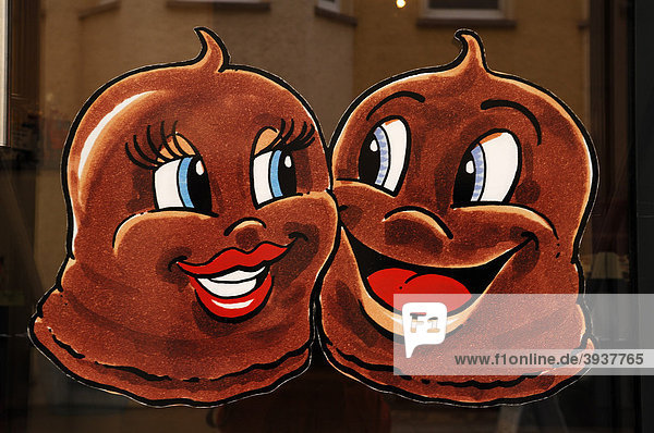 Zwei Comic Schokoküsse an einer Bäckerei, Schwerin, Mecklenburg ...