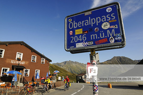 Cyclists on Oberalp Pass  Grisons  Switzerland  Europe