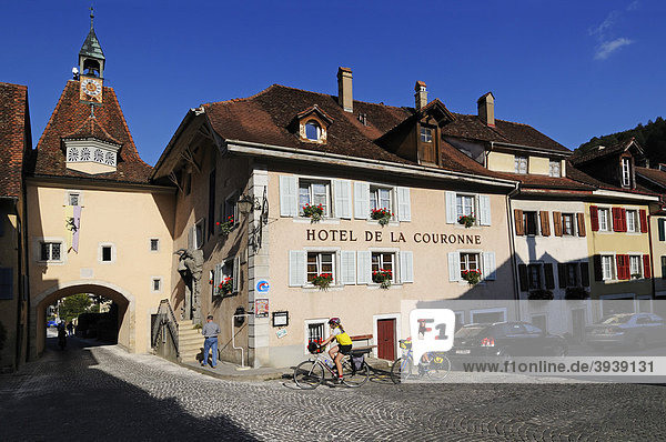 Cyclists in Saint d'Ursanne  Jura  Switzerland  Europe