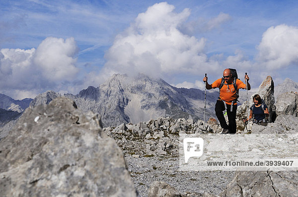 Hikers  Innsbrucker Klettersteig via ferrata  Karwendelgebirge mountains  Innsbruck  Tyrol  Austria  Europe