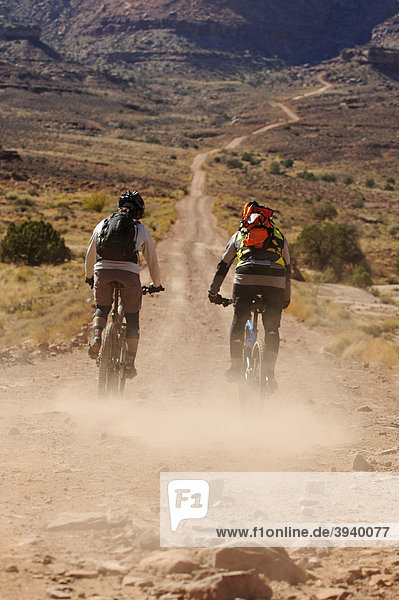 Mountain bikers  White Rim Trail  Moab  Utah  USA
