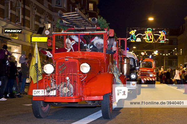 Old fire engine in the Christmas parade  Copenhagen  Denmark  Europe