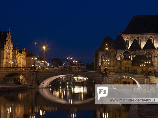 St. Michael's bridge the Graslei and Korenlei quaysides at night in Ghent  Flanders  Belgium  Europe