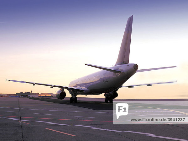 Passenger plane on a taxiway on its way to the runway at the airport Frankfurt am Main  Hesse  Germany  Europe
